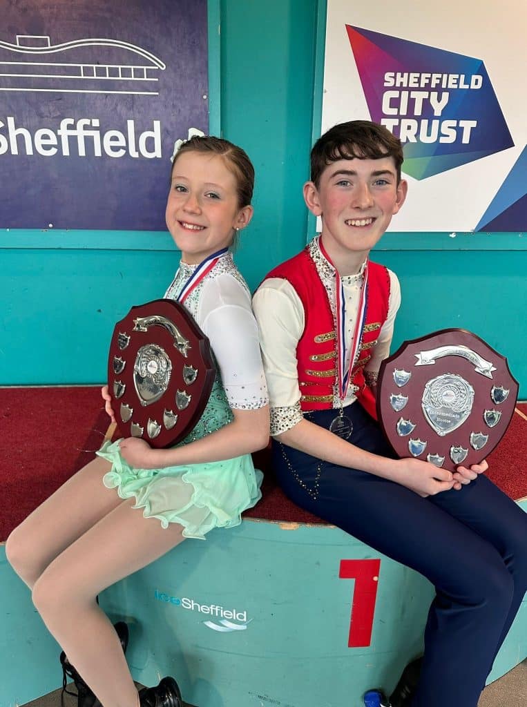 Lewis and Isla with their prizes