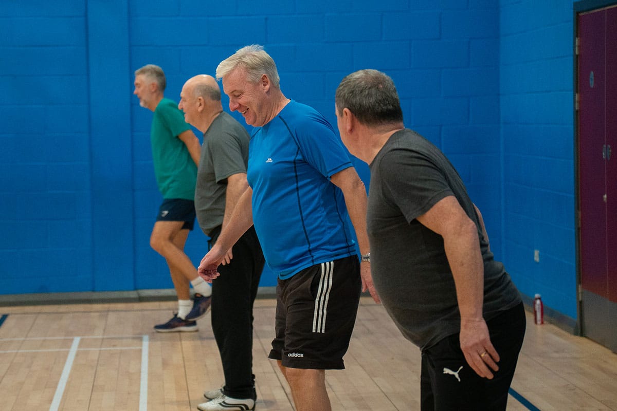 Group of men taking part in a fitness class