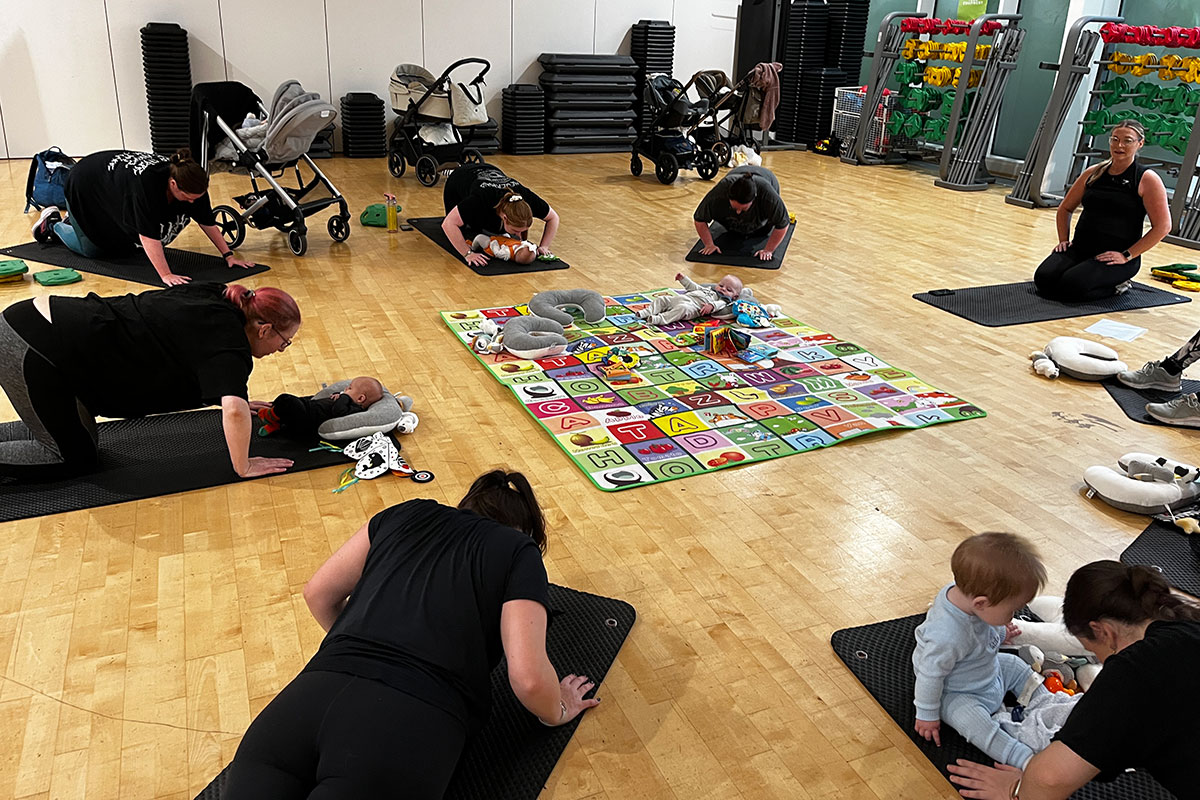 Mums and babies at fitness class