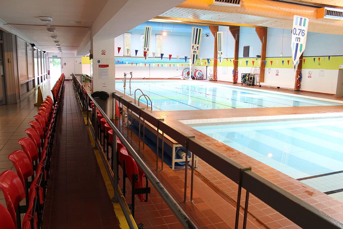 View of swimming pools and spectator area