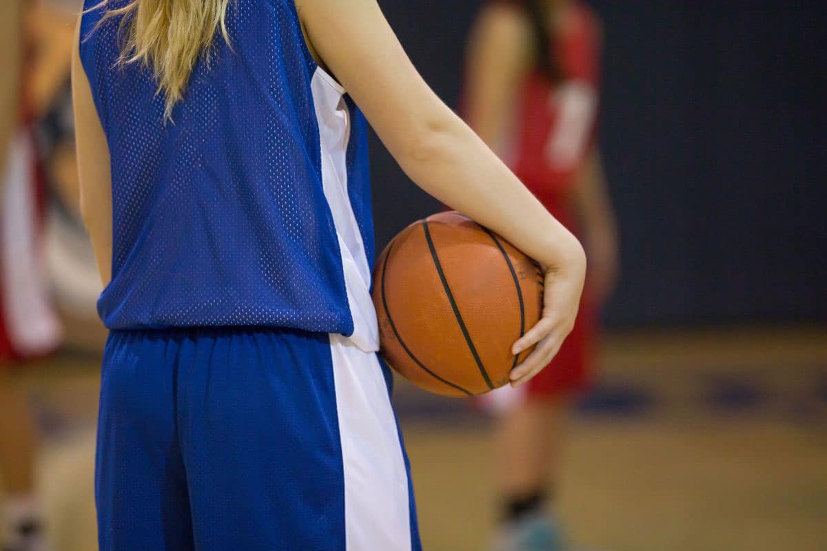 Girl holding basketball