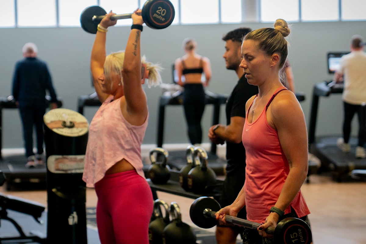 Members using gym equipment