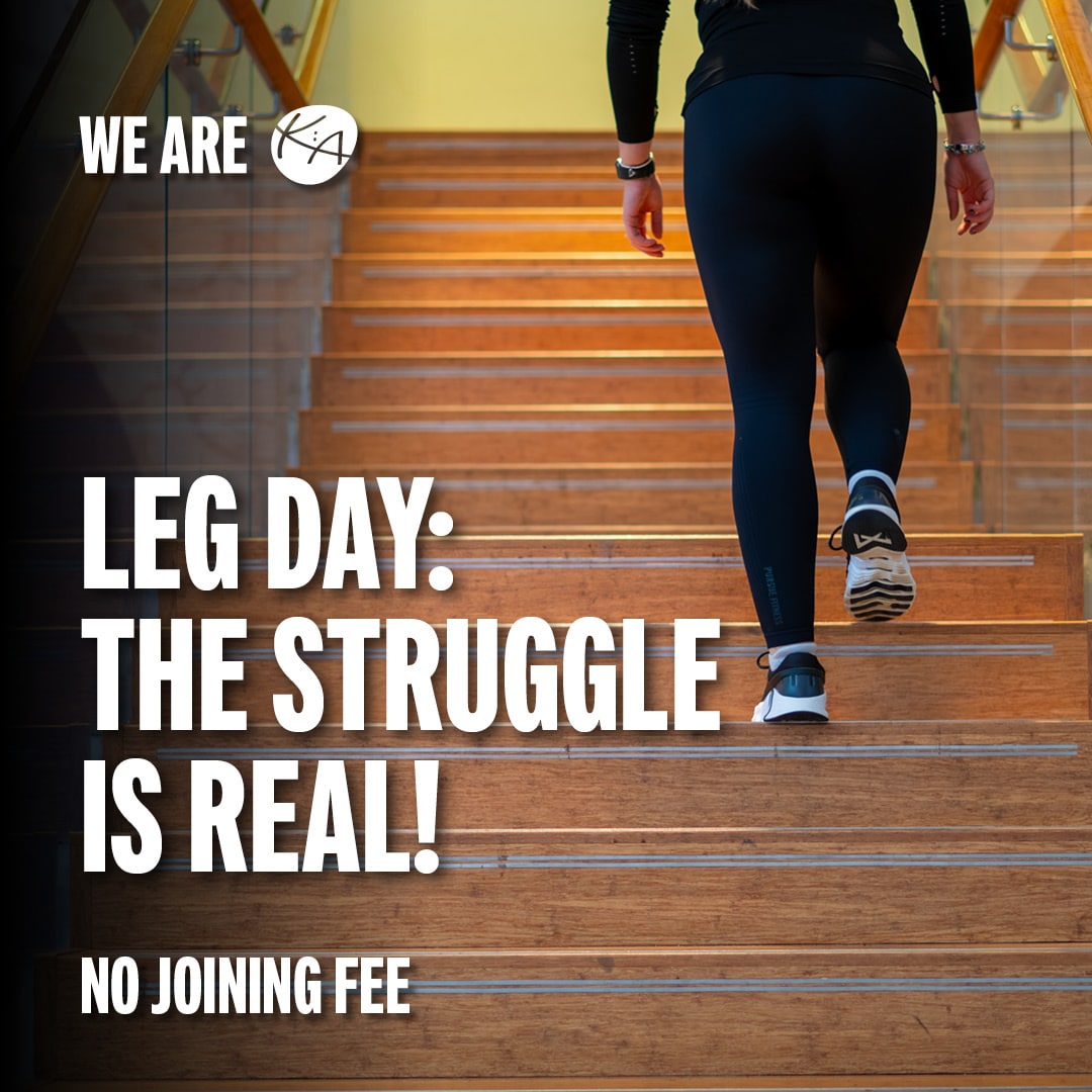 Female walking upstairs after leg day in the gym